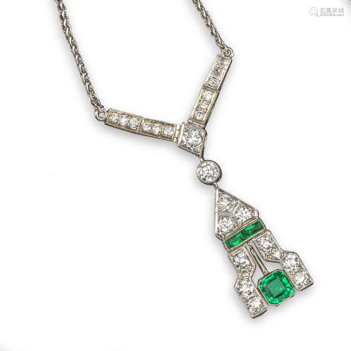An emerald and diamond pendant