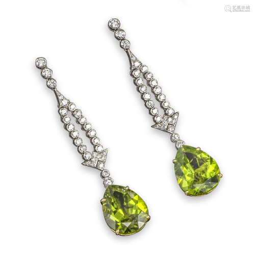 A pair of peridot and diamond drop earrings