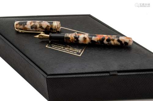 A modern Conway Stewart S8 Series fountain pen, in pinks and blacks, referred to as razor shell,