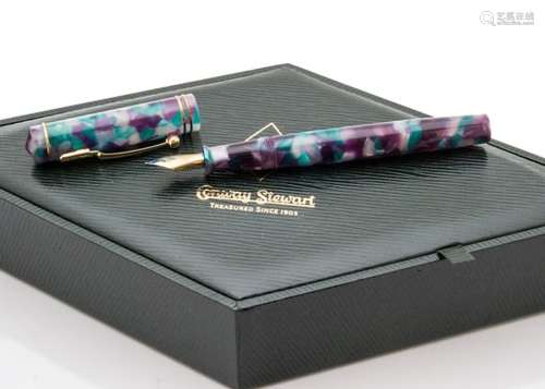 A modern Conway Stewart Dandy fountain pen, in green, purple and opaque white, referred to as Azure,