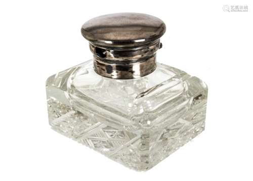 A large late Victorian cut glass desk inkwell by FS, 14cm wide, with silver plated hinged cap, glass