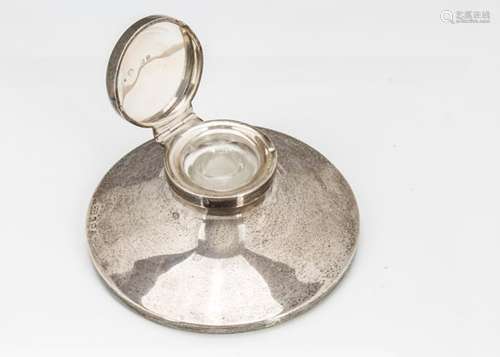 An Art Deco silver filled capstan inkwell with glass liner, some typical dents and marks