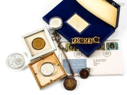 A 1970s silver stamp ingot and other medallions and coins, the boxed 1977 Danbury Mint stamp with