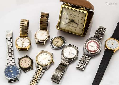 A group of vintage and modern gentlemen's wristwatches, including a c1960s Sicura example, appears