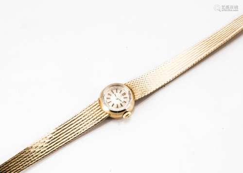 A c1970s Omega 9ct gold lady's wristwatch, 17mm case on integrated 9ct gold Omega strap, 27.3g,