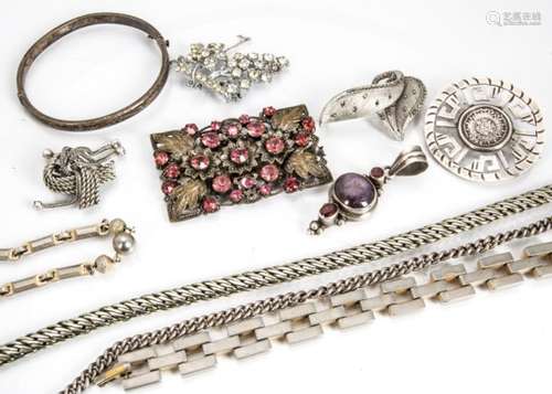 A quantity of silver and white metal costume jewels, including an amethyst and garnet pendant, a