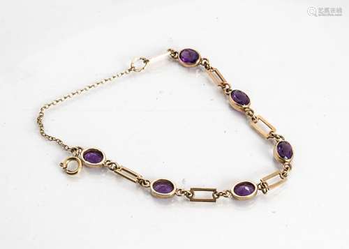 A 9ct gold amethyst line bracelet, the oval mixed cut stones in colett settings alternately set with