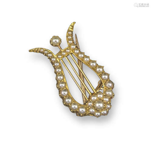 A Victorian seed pearl-set gold lyre brooch
