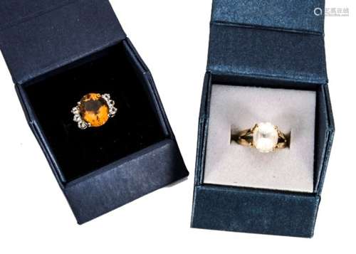 Two gem set 9ct gold dress rings, one set with oval cut citrine and white topaz circular cut