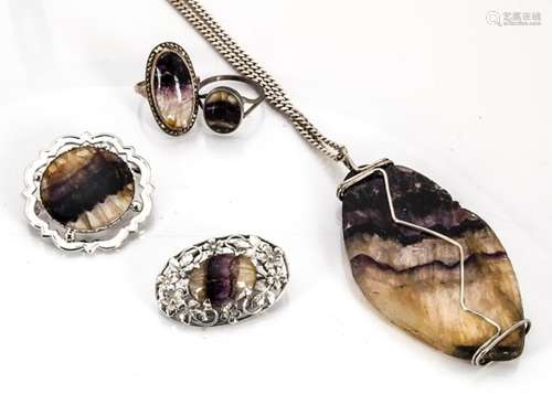 A collection of bluejohn and silver set jewels, comprising a large oval tablet pendant on a curb