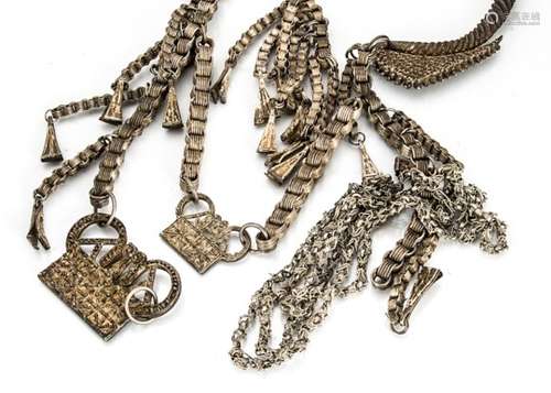 A collection of white metal North African and central and African jewels, including a large necklace