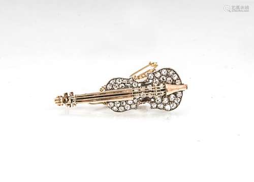 A 19th Century violin diamond encrusted brooch, the shaped body encrusted with rose cut diamonds,