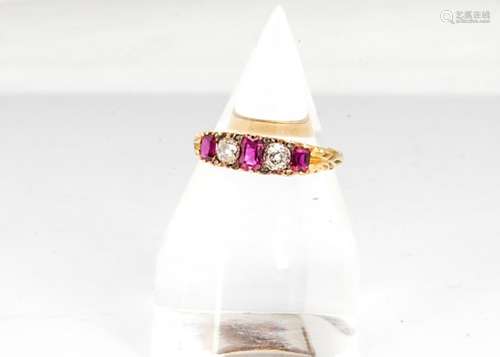 A Victorian 18ct gold ruby and diamond five stone ring, the three rectangular cut rubies alternately