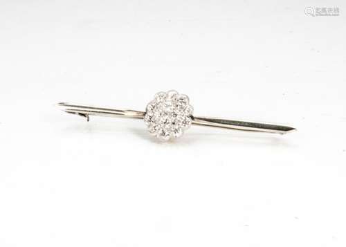 A diamond cluster bar brooch, the flower head centre set with transitional cut diamonds in