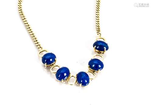 A 14ct gold lapis lazuli bracelet, the five claw set cabochons in gold settings on a flattened