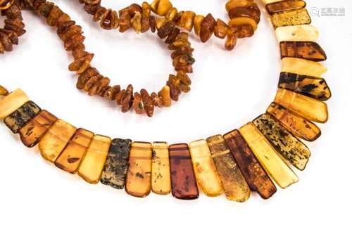 A collection of Baltic amber including rough bead necklaces, a polished fringe necklace and other