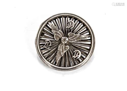 A late 19th/early 20th Century CTC brooch, modelled as a bicycle wheel, hinged opening to reveal a