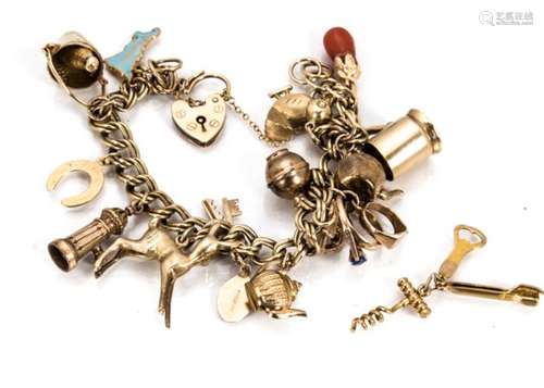 A 9ct gold charm bracelet, the double curb link bracelet set with various charms including wishing