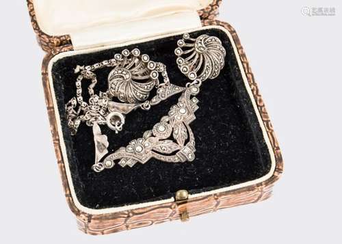 An Art Deco silver and marcasite necklace and earring set, in case