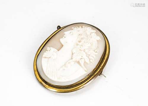 A Victorian gilt metal framed cameo brooch, carved with the profile of a young classical maiden, 7cm