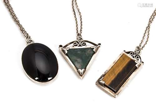 Three contemporary silver hardstone pendant necklaces, including a triangular cut moss agate, a