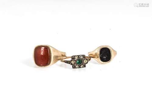 Two gentleman's hardstone gold signet rings, in cornelian and onyx, and a paste set Art Deco costume