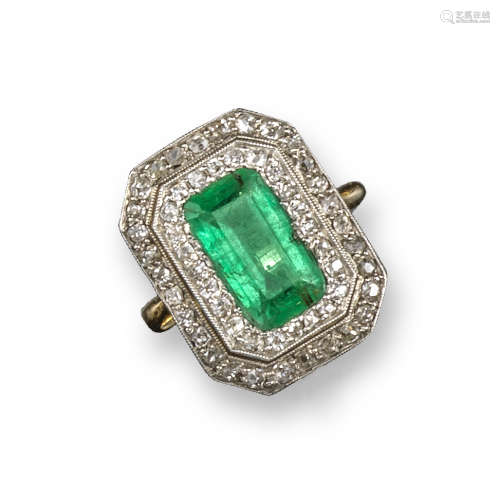 An Edwardian emerald and diamond plaque ring