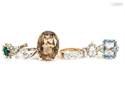 A collection of six dress rings, including four yellow metal examples and two silver, approximate