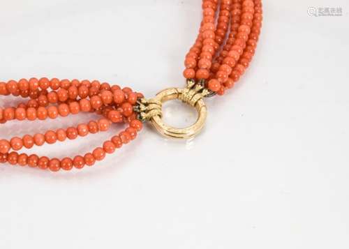 An Italian multi strand coral necklace, on a circular gold engraved clasp with hinged opening and