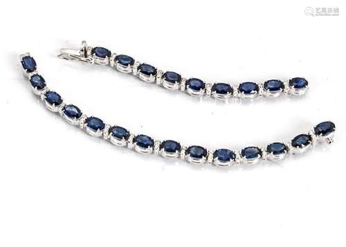 A sapphire and diamond line bracelet, the oval mixed cut sapphires alternately set with pairs of