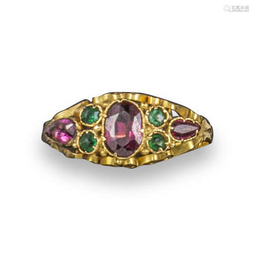 A Victorian emerald and garnet half-hoop ring