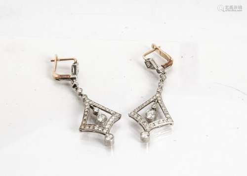 A pair of diamond platinum set and gold clip Art Deco style earrings, the diamond set clips