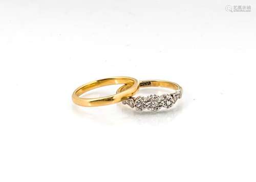 An 18ct gold three stone illusion set diamond ring, ring size K, 2.5g together with a 22ct gold