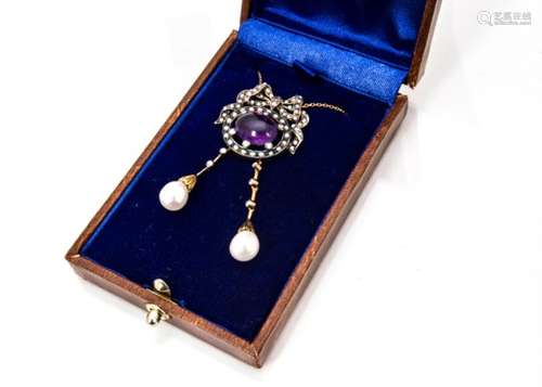 An Edwardian style amethyst, pearl and diamond pendant, the seed pearl set bow supporting an oval