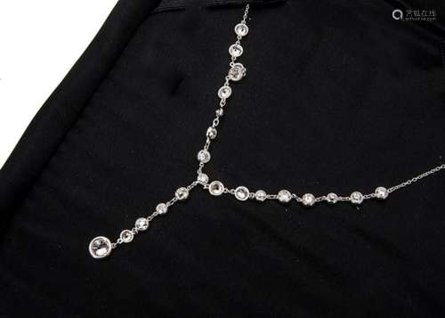 A platinum and diamond fringe and drop necklace, the fine chain supporting twenty two brilliant