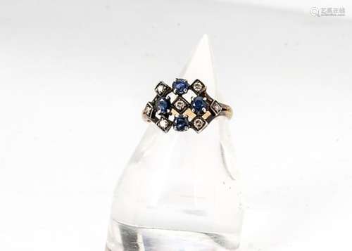 A sapphire and diamond tablet ring, the lattice setting set with five diamonds and four sapphires,