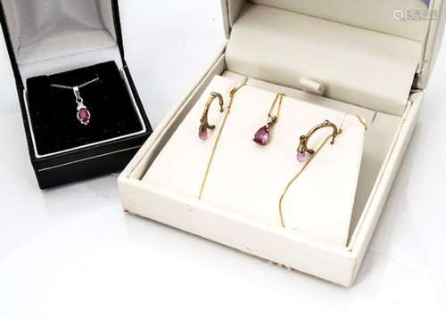 A pink sapphire drop pendant, the bale set with rough cut diamond together with a pair of pink