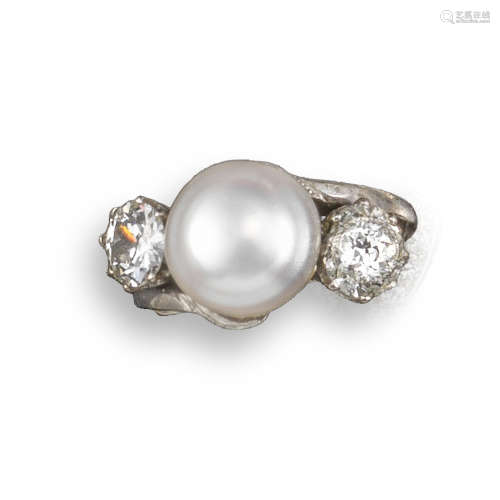A cultured pearl and diamond three-stone ring