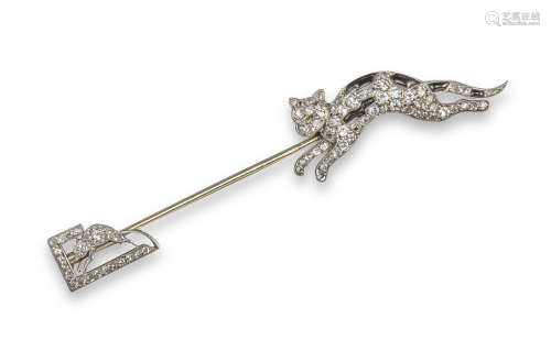 An Art Deco French onyx and diamond jabot pin