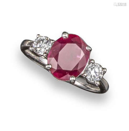 A ruby and diamond three-stone ring