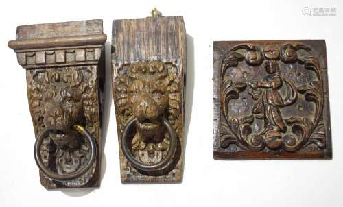 Two similar antique carved oak furniture mounts formed as lion masks with metal ring handles, 17cm x