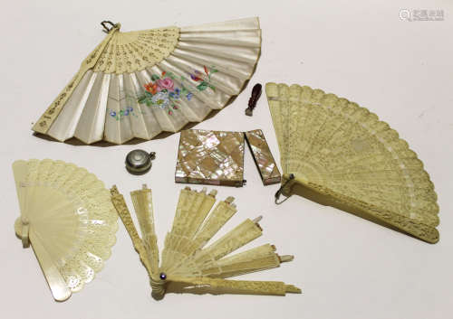 Collection of ivory fans and a mother of pearl card case, plus a miniature seal (qty)