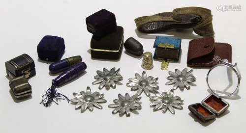 Box containing various items including ring boxes and silver metal French stars made by Etains du