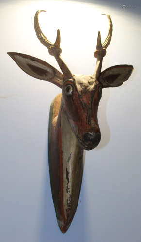 Wooden painted model of a stag's head complete with bone antlers, early 20th century, the model