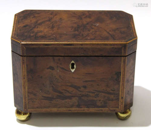 Mid 19th century grained mahogany caddy with inlay and ivory escutcheon, the caddy raised on four