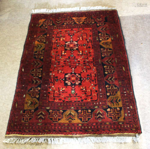 Modern Caucasian style wool carpet, multi-gulled border, central panel of floral designs, mainly