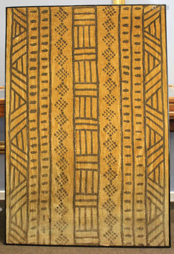 Example of tribal aboriginal art in black wooden frame, the hessian type material with black painted