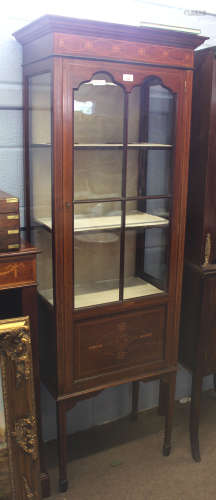 Edwardian mahogany vitrine typically inlaid throughout with stringing and geometric designs,