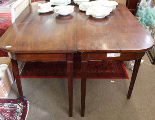 Pair of early 19th century mahogany D-end tables, each raised on plain tapering square supports (