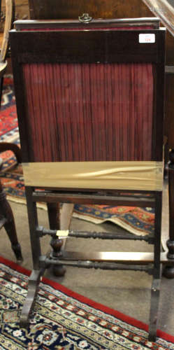 19th century rosewood screen, the central lifting fabric panel raised on splayed feet, 41cm wide